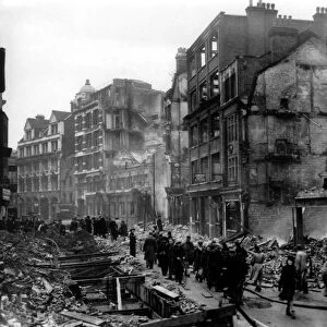 Home front 1940. Showing the destruction caused by German bombing, Brits go about