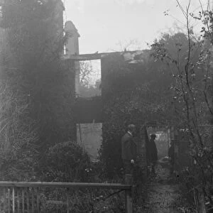 What is left behind following a cottage fire in Chelsfield, Kent. 1936