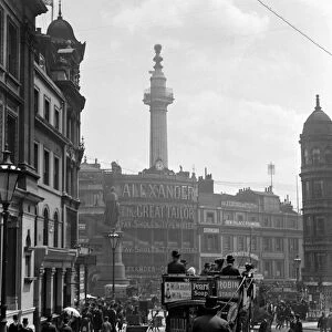 London street scene. The column of The Monument, ( to the Great Fire of London