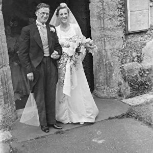 The wedding of Mr Martin O Sheffield and Miss Jean Wall. The bride and bridegroom