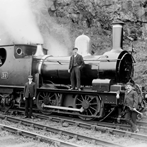 GWR tank number 34 pictured with four men on the St Ives branch. Around 1905