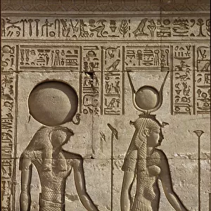 Ancient Egypt, Wall painting/carving, Horus and Isis receive an offering from the pharaoh, Temple of Hathor, Dendera (photo)