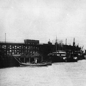Blyth Harbour, showing an amount of colliers lying alongside Blyth Staiths with a Harbour