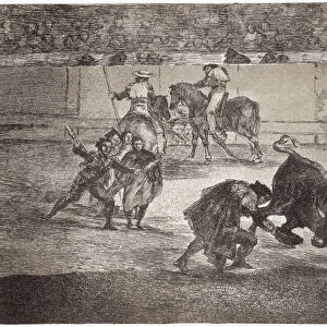 Bullfighting: a bullfighter enters the arena to kill the bull with a hat instead of
