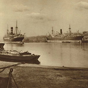 Carriers of Londons food: unloaded cargo boats in the south dock of West India Docks (b / w photo)