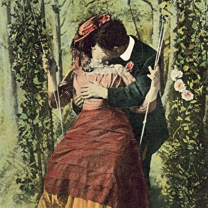 Couple kissing on a swing (coloured photo)