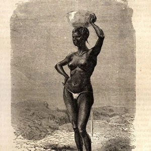 The daughter of a marabout from Oualet (Mauritania), wearing a jatte on his head to make