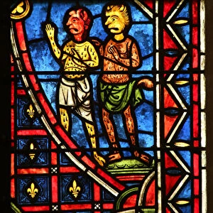 Demons look at Theophilus (stained glass)