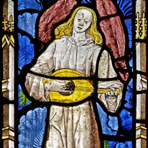 The East window (Ew) depicting a musician angel with lute (stained glass)
