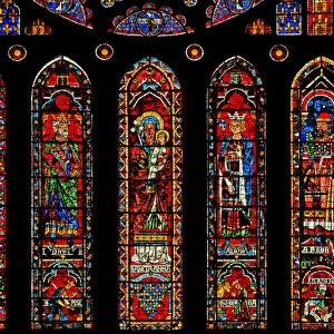 Figures beneath the north rose window: Melchisedek, David, St Anne, Solomon