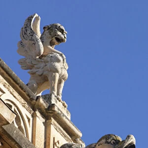 Gargoyle and acroteria, detail from the exterior (stone)