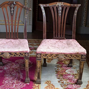 Two George II pattern chairs (mahogany and parcel-gilt)