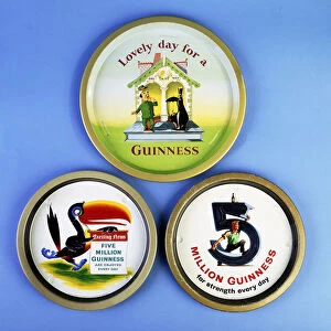 Three Guinness trays, (tin)