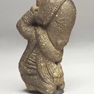 Kneeling man, c. 800 BC-200 AD (terracotta)