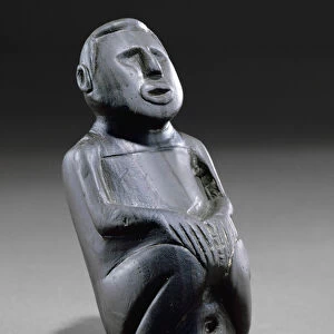 Male effigy pipe, 1100-1300 (banded slate)