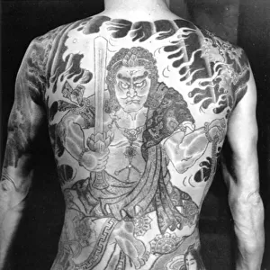 Man with traditional Japanese Irezumi tattoo, c. 1910 (b / w photo)