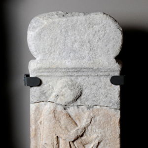 Marble gravestone depicting a woman in mourning in relief, from Delos or Rhenia, Greece