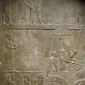 Mesopotamia: Elams campaign: Assurbanipal on his tank and Elamite prisoners