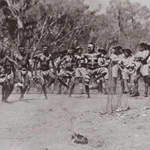 Natives dance to an audience of Aussies (b / w photo)