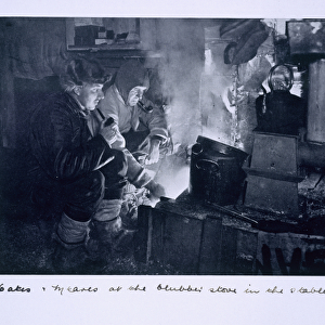 Oates & Meares at the blubber stove in the stables, from Scott