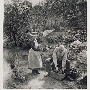An Old Man and his Daughter Gardening (b&w photo)