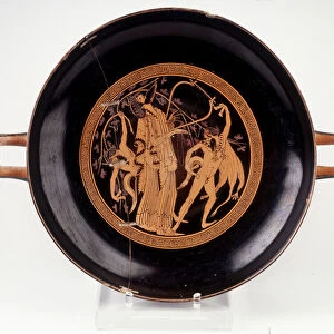 Painting on cut: representation of Dionysos (Bacco) musician, he plays lyre. 490 BC