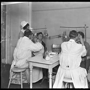 Two patients being examined, Examining room #2, Seton Hospital, Spuyten Duyvil, Bronx