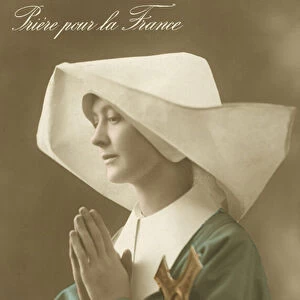 Praying nun in starched coif (colour photo)