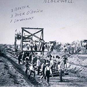 Rail Track laying machine, Blackwell, Oklahoma, 1909 (b / w photo)
