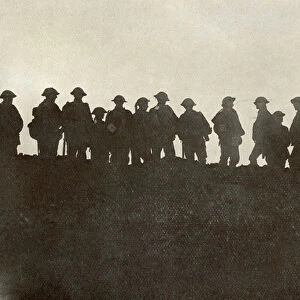 Silhouette of reserve soldiers waiting to move up to the front line during World War One