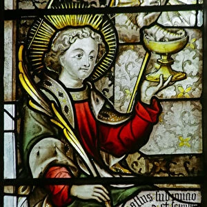 St John writing the Gospel (stained glass)