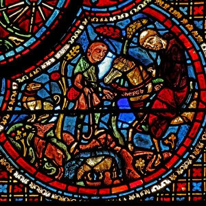 The St Lubin window: his education - a monk gives him a belt with an inscribed alphabet