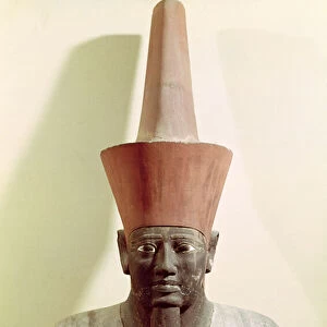 Detail of a statue of Mentuhotep II, enthroned and wearing the red crown of Lower Egypt