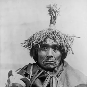 Takou Indian doctor, Alaska, c. 1899 (b / w photo)