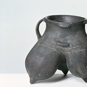 Tripod vessel, Lung-shan culture, c. 2000 BC (black earthenware)
