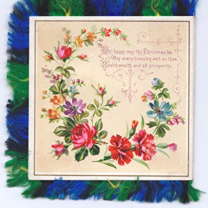 A Victorian Christmas Card of a garland of roses and carnations