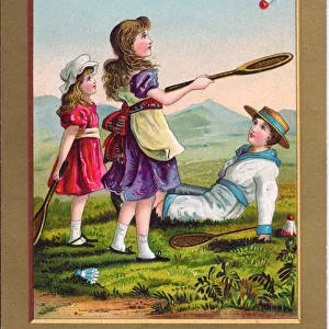 A Victorian Christmas card of two girls and a boy playing badminton, c
