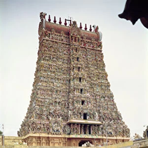 View of the carved exterior of the south gopuram (photo)