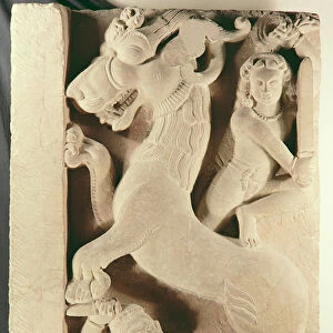 Warriors fighting a lion-griffin (stone)