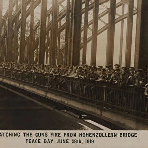 Watching the guns fire from Hohenzollern Bridge, Peace Day, 28 June 1919 (colour litho)