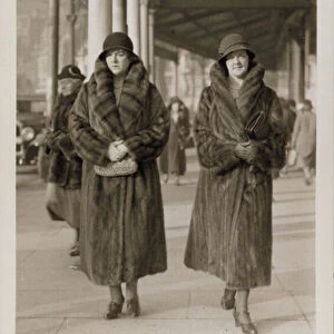 Two women in fur coats (b / w photo)