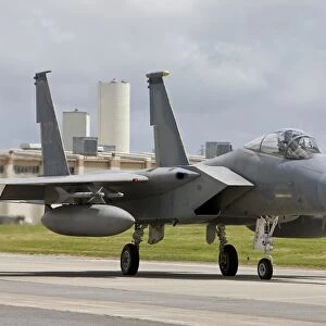 An F-15 Eagle taxis to the end of runway at Kadena Air Base, Japan