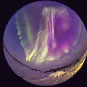 Fish-eye lens view of an aurora borealis in Churchill, Manitoba, Canada
