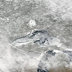 A relatively rare blanket of ice rests on the surface of Lake Superior