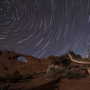 Star trails over Skyline Arch at Arches National Park, Utah