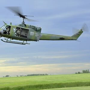 A UH-1N Huey helicopter prepares to land at Minot Air Force Base, North Dakota