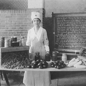 Woman wearing the official badge and uniform of the U. S. Food Administration, 1917