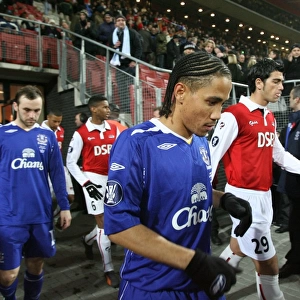 Football - AZ Alkmaar v Everton UEFA Cup Group Stage - Second Round Matchday Five Group A - DSB-Stadion, Alkmaar, Holland - 07 / 08 - 20 / 12 / 07 Evertons Steven Pienaar and team mates walk out for the start of the match with AZ Alkmaar players Mandatory Credit: Action Images /