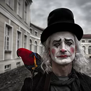 Clown and his parrot