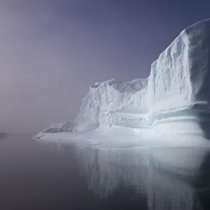 Iceberg in the sea outside the Kangia Ilulissat Icefjord. Iceberg from the Sermeg Kujalleg Glacier